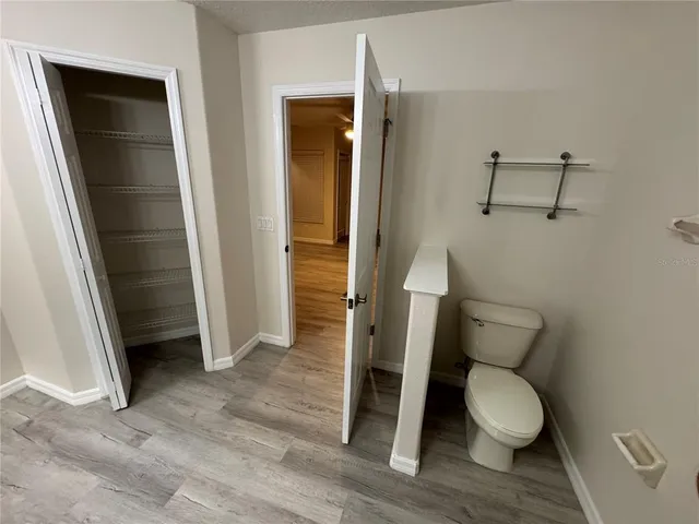 a kitchen with a sink and chandelier