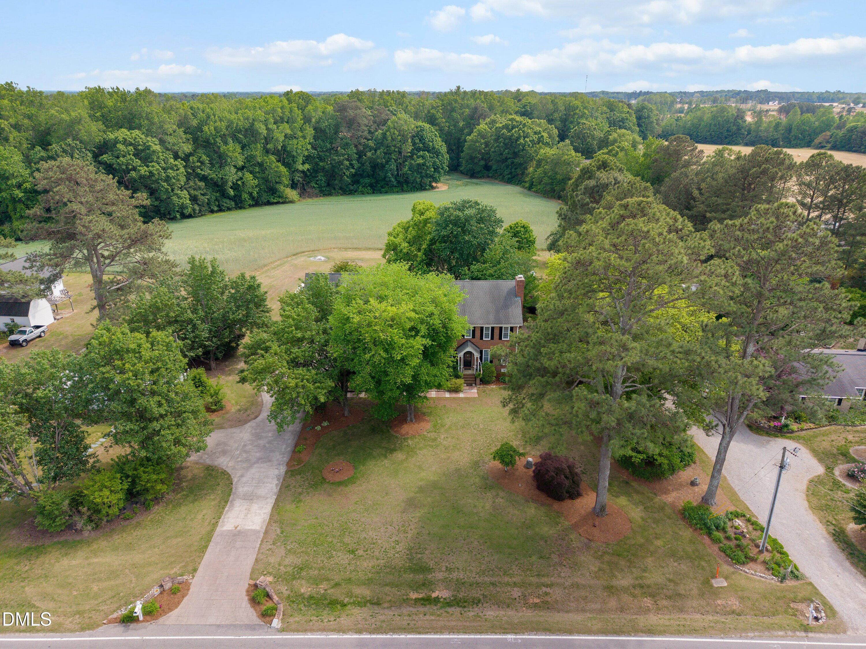 6612 Fowler Road Zebulon, NC 27597 - Photo 4 of 42 a view of a back yard