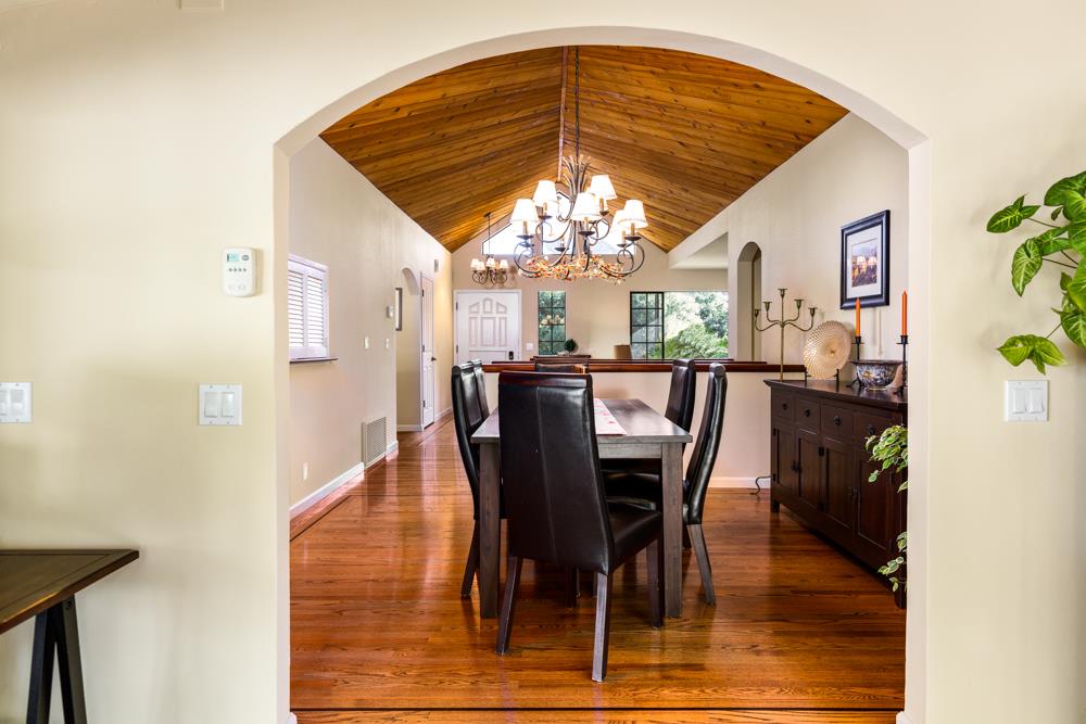 115 Santa Fe Ridge Aptos, CA 95003 - Photo 21 of 50 a view of a dining room with furniture window and wooden floor
