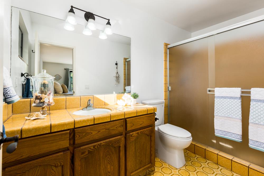 115 Santa Fe Ridge Aptos, CA 95003 - Photo 26 of 50 a bathroom with a sink toilet and shower