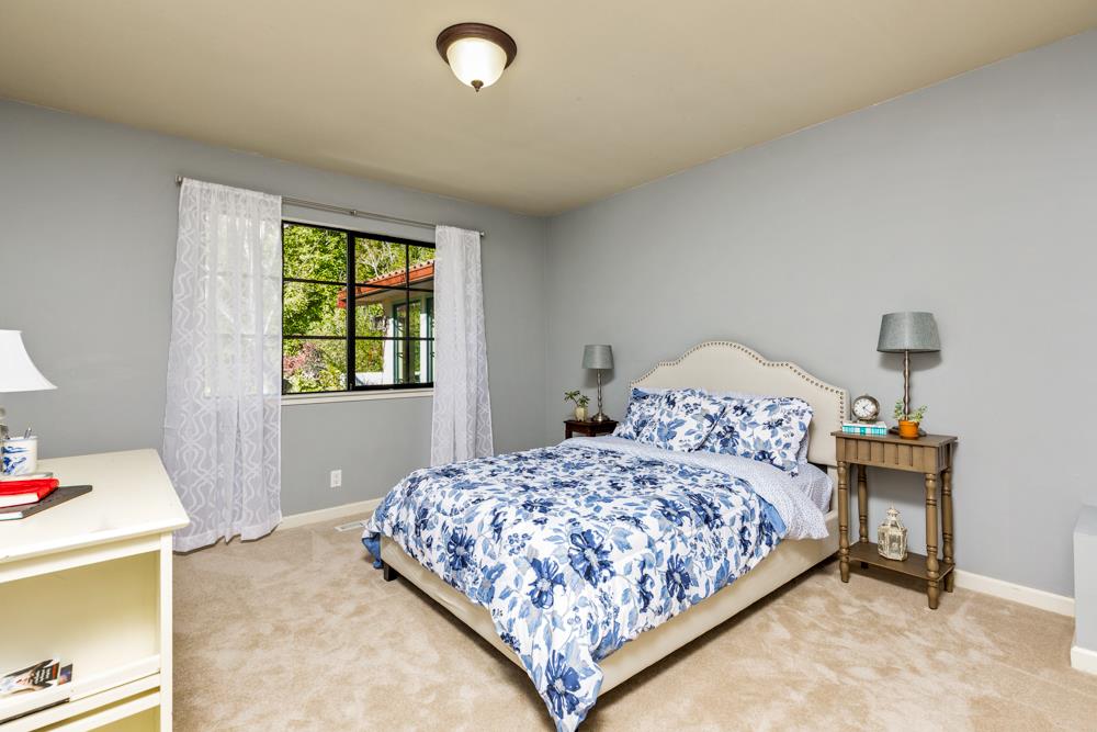 115 Santa Fe Ridge Aptos, CA 95003 - Photo 29 of 50 a bedroom with a bed and window