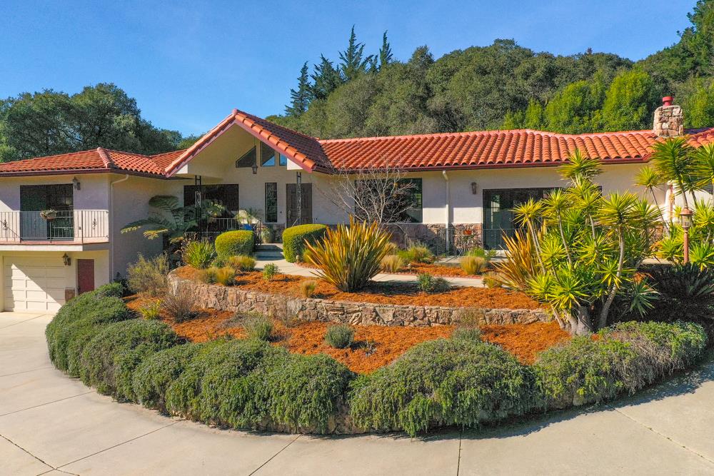 115 Santa Fe Ridge Aptos, CA 95003 - Photo 3 of 50 a view of a house with a wooden fence