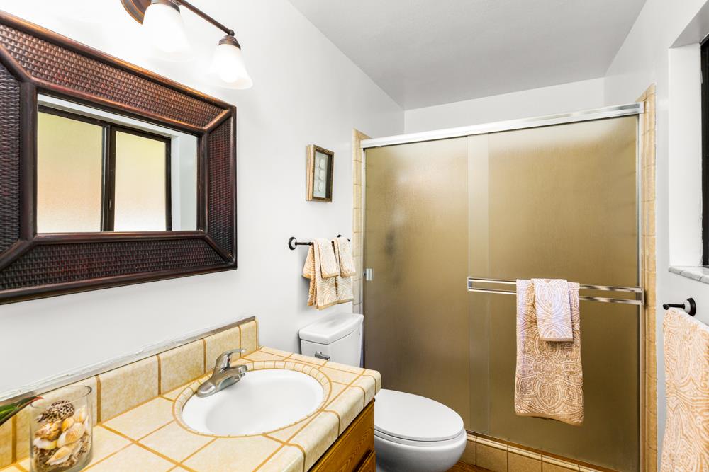 115 Santa Fe Ridge Aptos, CA 95003 - Photo 31 of 50 a bathroom with a sink toilet and shower