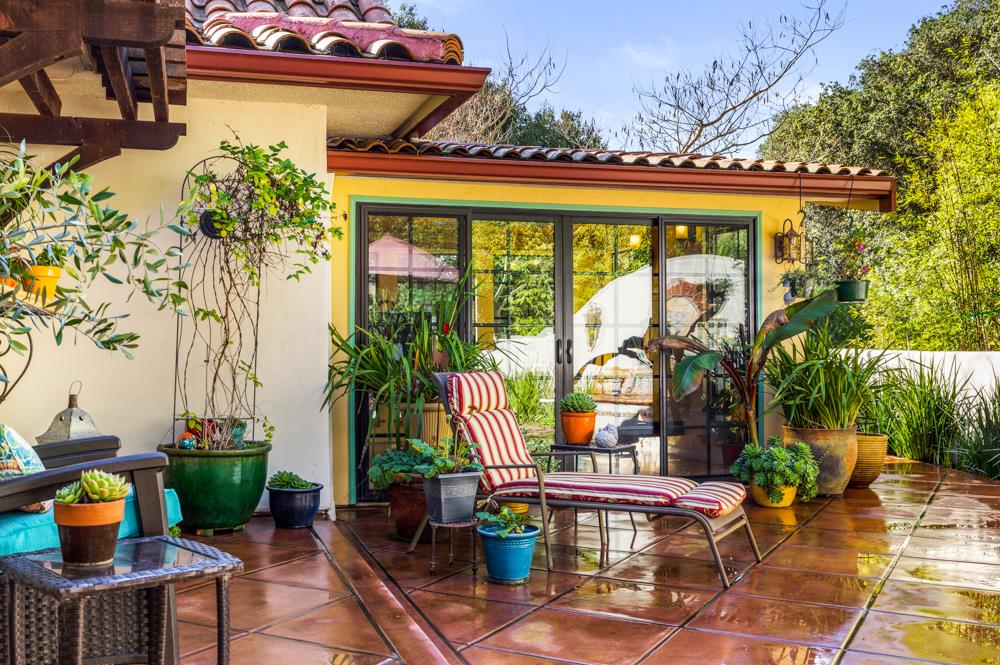 115 Santa Fe Ridge Aptos, CA 95003 - Photo 37 of 50 an outdoor sitting area with furniture and garden view