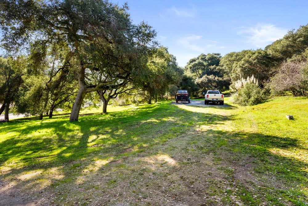 115 Santa Fe Ridge Aptos, CA 95003 - Photo 47 of 50 a view of swimming pool with a garden and trees