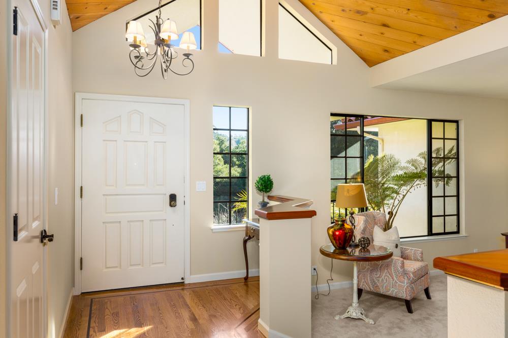 115 Santa Fe Ridge Aptos, CA 95003 - Photo 5 of 50 a view of a workspace with furniture and a window