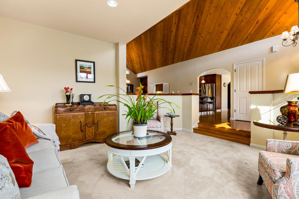 115 Santa Fe Ridge Aptos, CA 95003 - Photo 8 of 50 a living room with furniture a rug and white walls