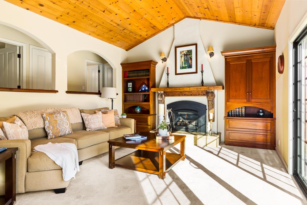 115 Santa Fe Ridge Aptos, CA 95003 - Photo 10 of 50 a living room with furniture and a fireplace