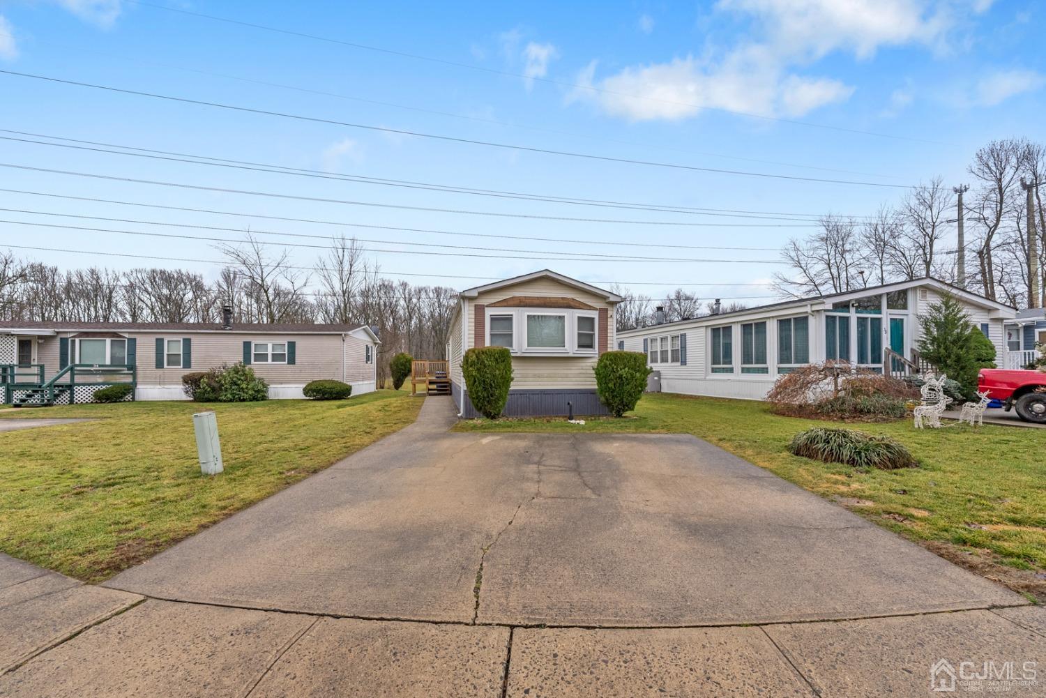36 Whitman Road North Brunswick, NJ 08902 - Photo 1 of 31 a house view with a garden space
