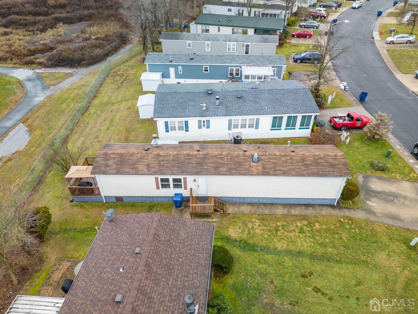 36 Whitman Road North Brunswick, NJ 08902 - Photo 26 of 31 a aerial view of a house with swimming pool