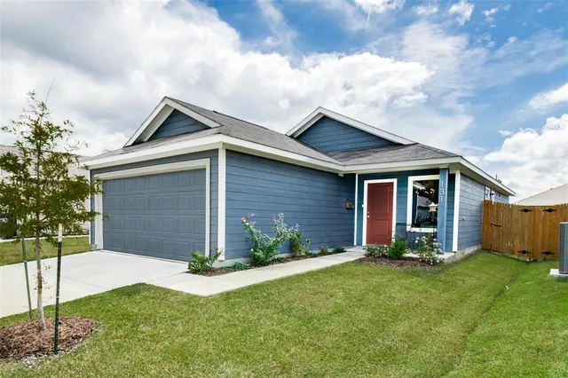 front view of house with a yard