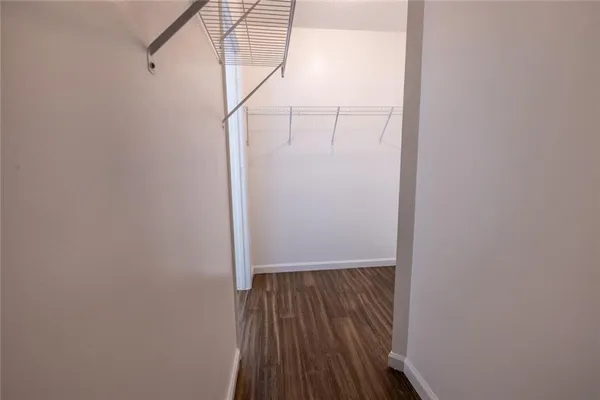 a view of balcony with wooden floor
