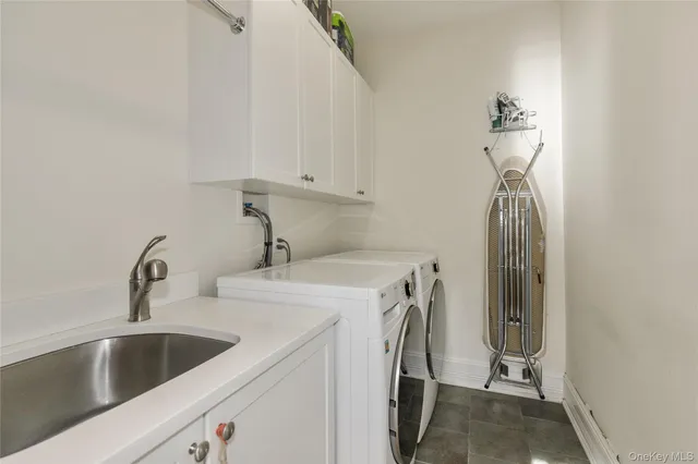a bathroom with a sink and mirror