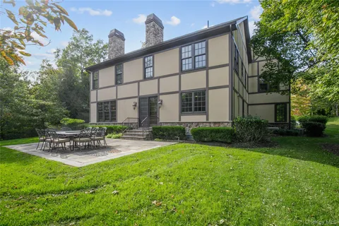 a view of garden with patio