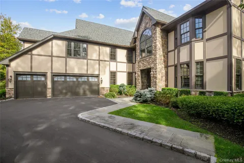 a view of a large building next to a yard