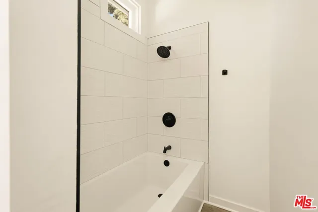 a bathroom with a bathtub