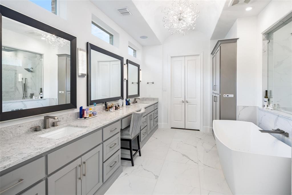 818 Brett Drive Allen, TX 75013 - Photo 16 of 38 a spacious bathroom with a double vanity sink mirror double and shower