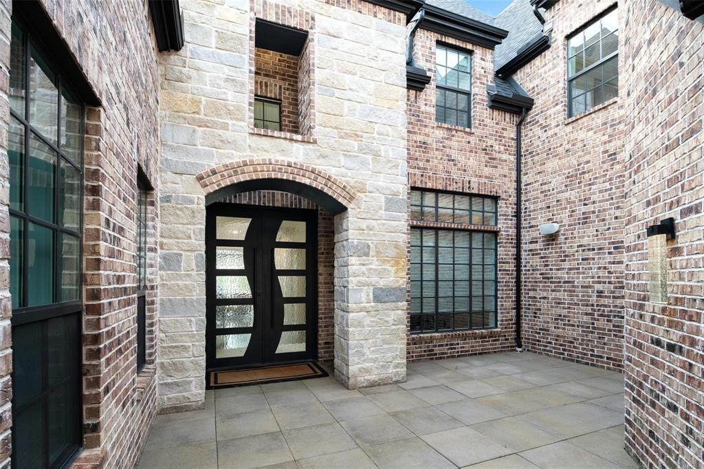 818 Brett Drive Allen, TX 75013 - Photo 28 of 38 a view of entryway with a brick wall