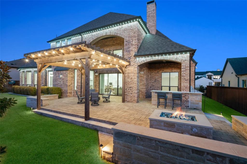 818 Brett Drive Allen, TX 75013 - Photo 30 of 38 a front view of a house with garden