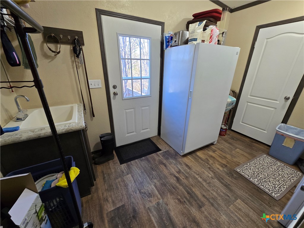 390-400 North Fawn Ridge Drive Leander, TX 78641 - Photo 21 of 48 a view of a storage and utility room with front door
