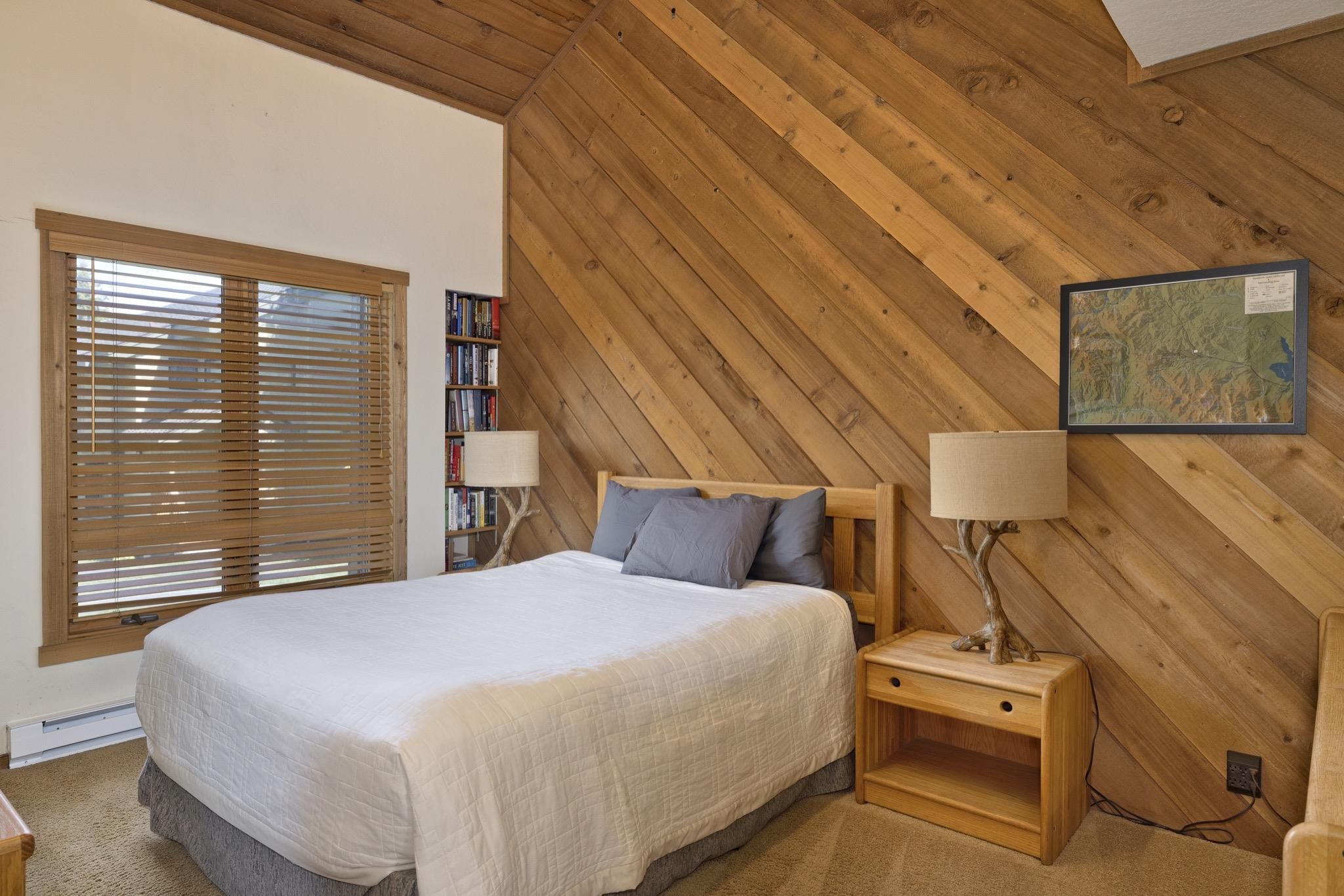 417 Snowcreek Road, Unit 417 Mammoth Lakes, CA 93546 - Photo 20 of 31 Vaulted ceiling with wood paneling