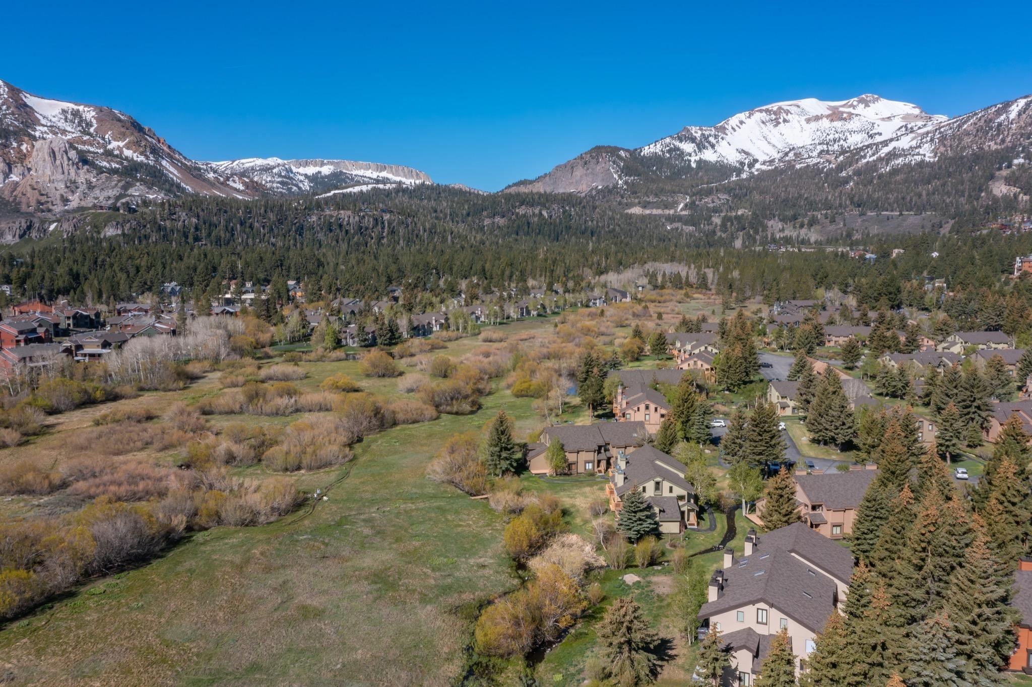 417 Snowcreek Road, Unit 417 Mammoth Lakes, CA 93546 - Photo 31 of 31 Expansive mountain landscape featuring snow-capped peaks and evergreen forests