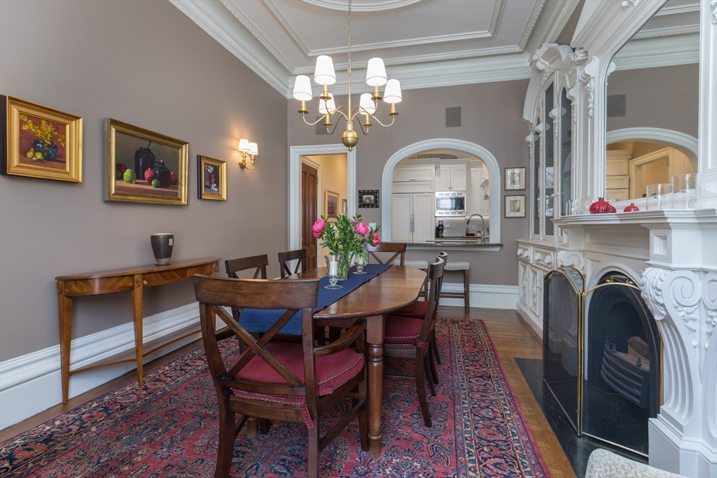 129 Beacon Street, Unit 1 Boston, MA 02116 - Photo 13 of 42 a view of a dining room with furniture