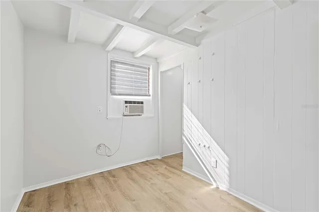 a kitchen with stainless steel appliances a stove a sink and a refrigerator