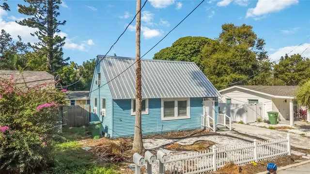 front view of a house with a small yard