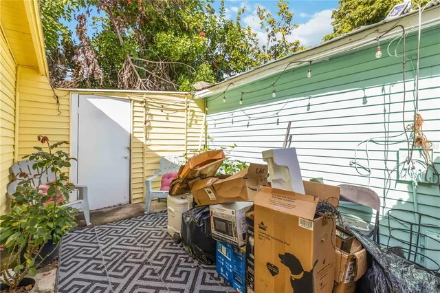 an entryway in a hall with a workspace