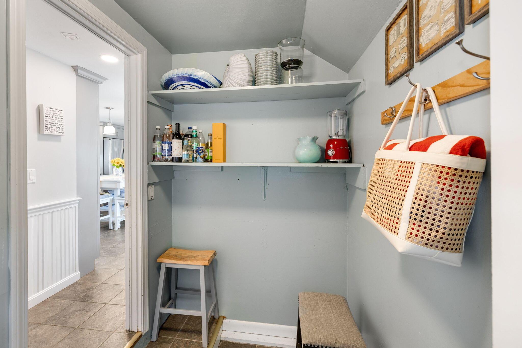 26 Captain Chase Road South Yarmouth, MA 02664 - Photo 11 of 54 a hallway with a dining table and chairs