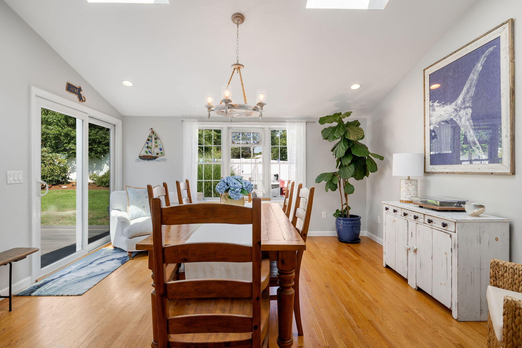 26 Captain Chase Road South Yarmouth, MA 02664 - Photo 17 of 54 a view of a dining room with furniture window and wooden floor