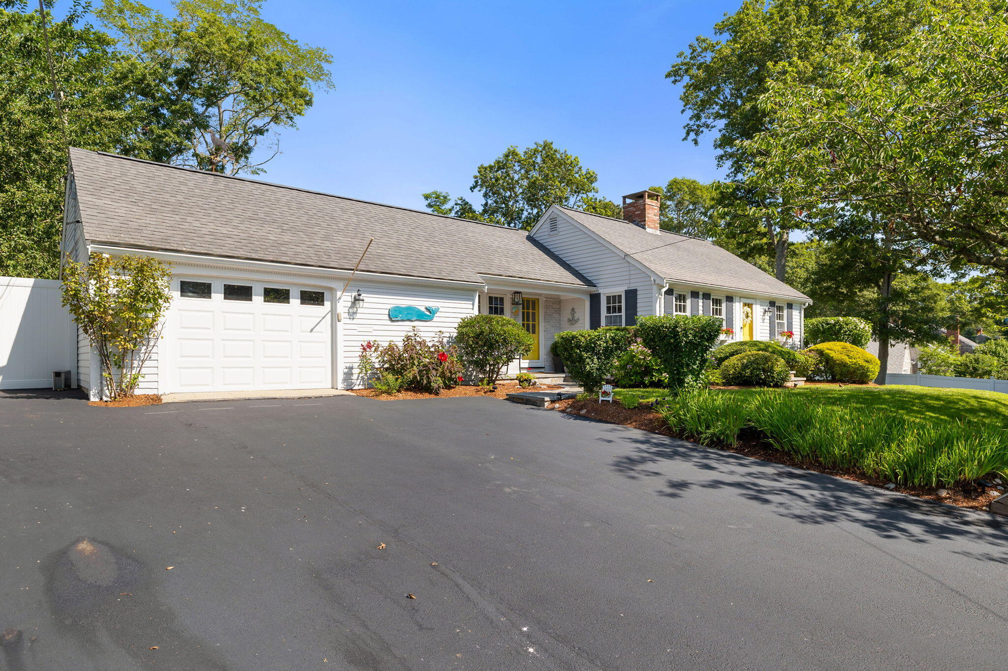 26 Captain Chase Road South Yarmouth, MA 02664 - Photo 2 of 54 a house view with a garden space