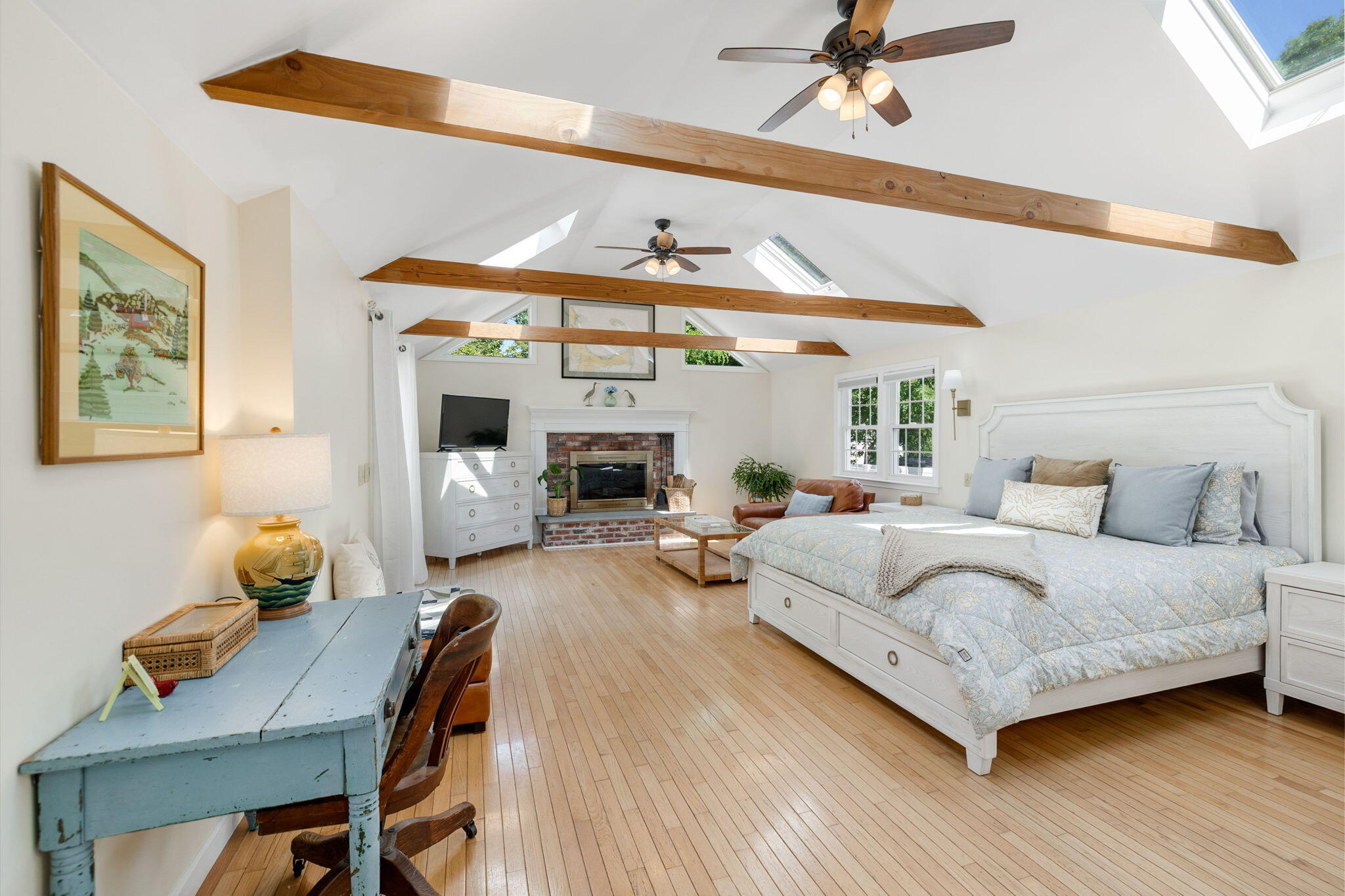 26 Captain Chase Road South Yarmouth, MA 02664 - Photo 23 of 54 a spacious bedroom with a bed a table and chair