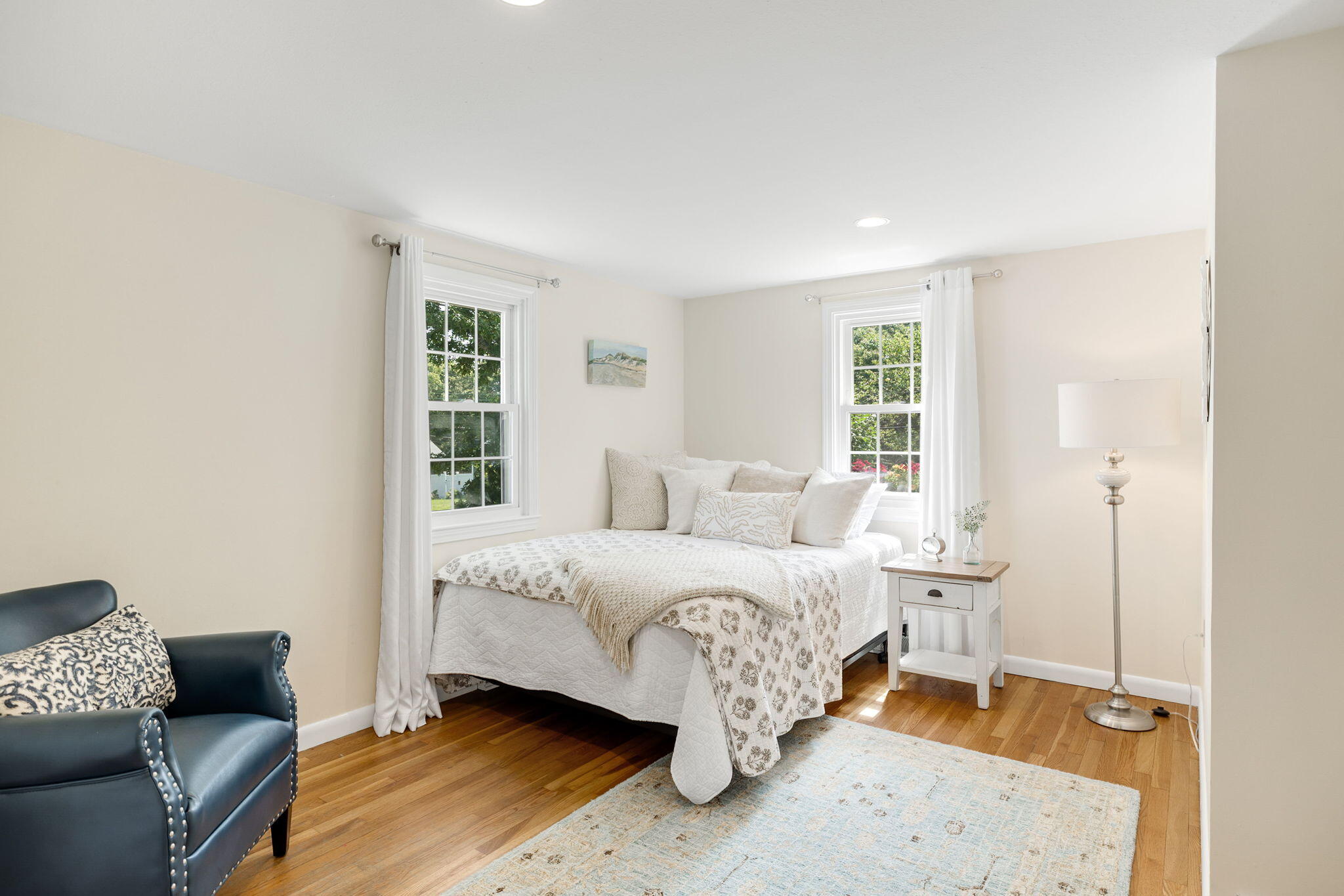 26 Captain Chase Road South Yarmouth, MA 02664 - Photo 27 of 54 a bedroom with a bed and a couch