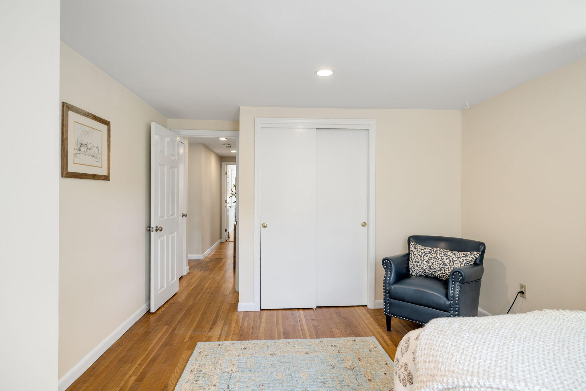 26 Captain Chase Road South Yarmouth, MA 02664 - Photo 28 of 54 a living room with a couch and a wooden floor