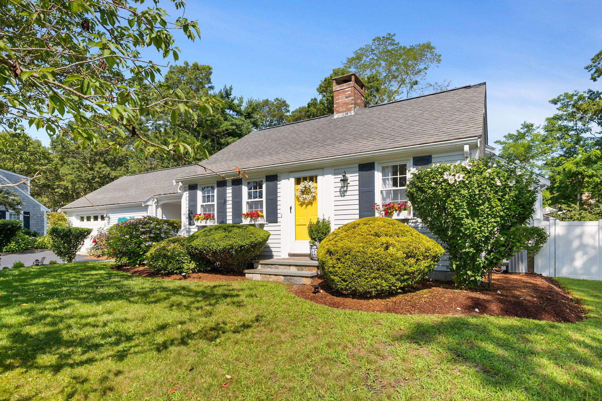 26 Captain Chase Road South Yarmouth, MA 02664 - Photo 3 of 54 a front view of a house with garden