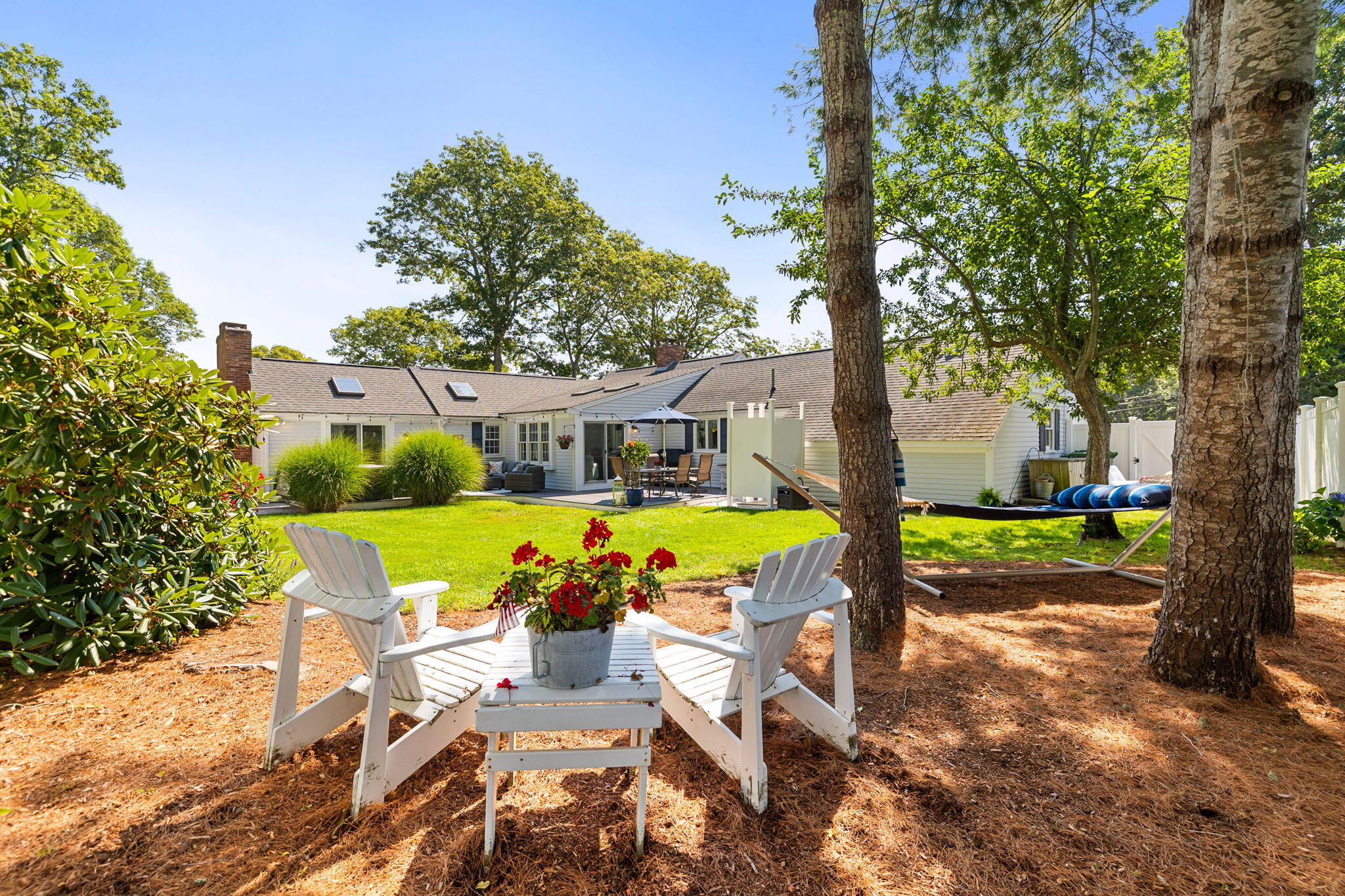 26 Captain Chase Road South Yarmouth, MA 02664 - Photo 33 of 54 a view of backyard with swimming pool garden and outdoor seating