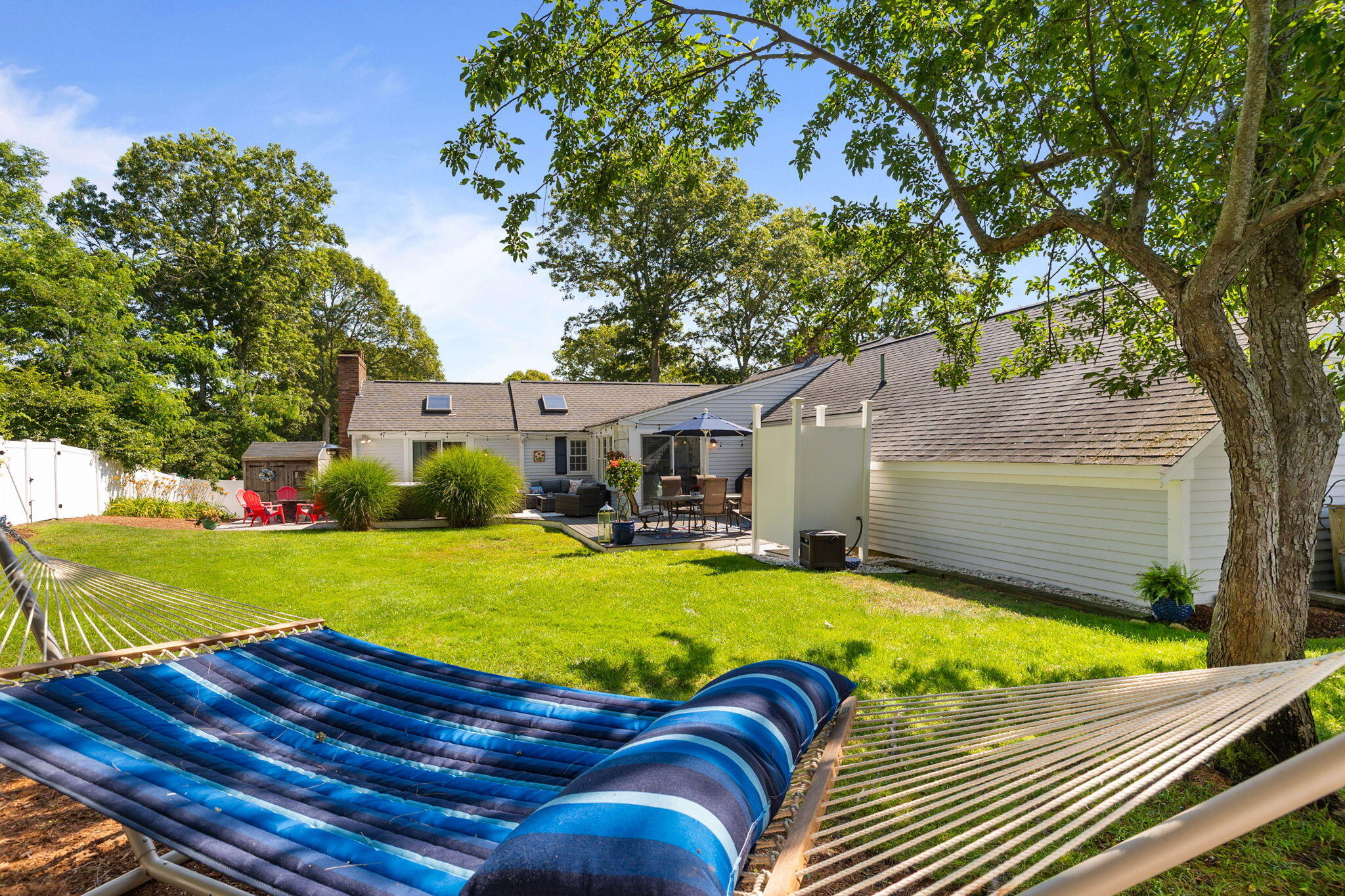 26 Captain Chase Road South Yarmouth, MA 02664 - Photo 34 of 54 a view of a house with swimming pool and yard