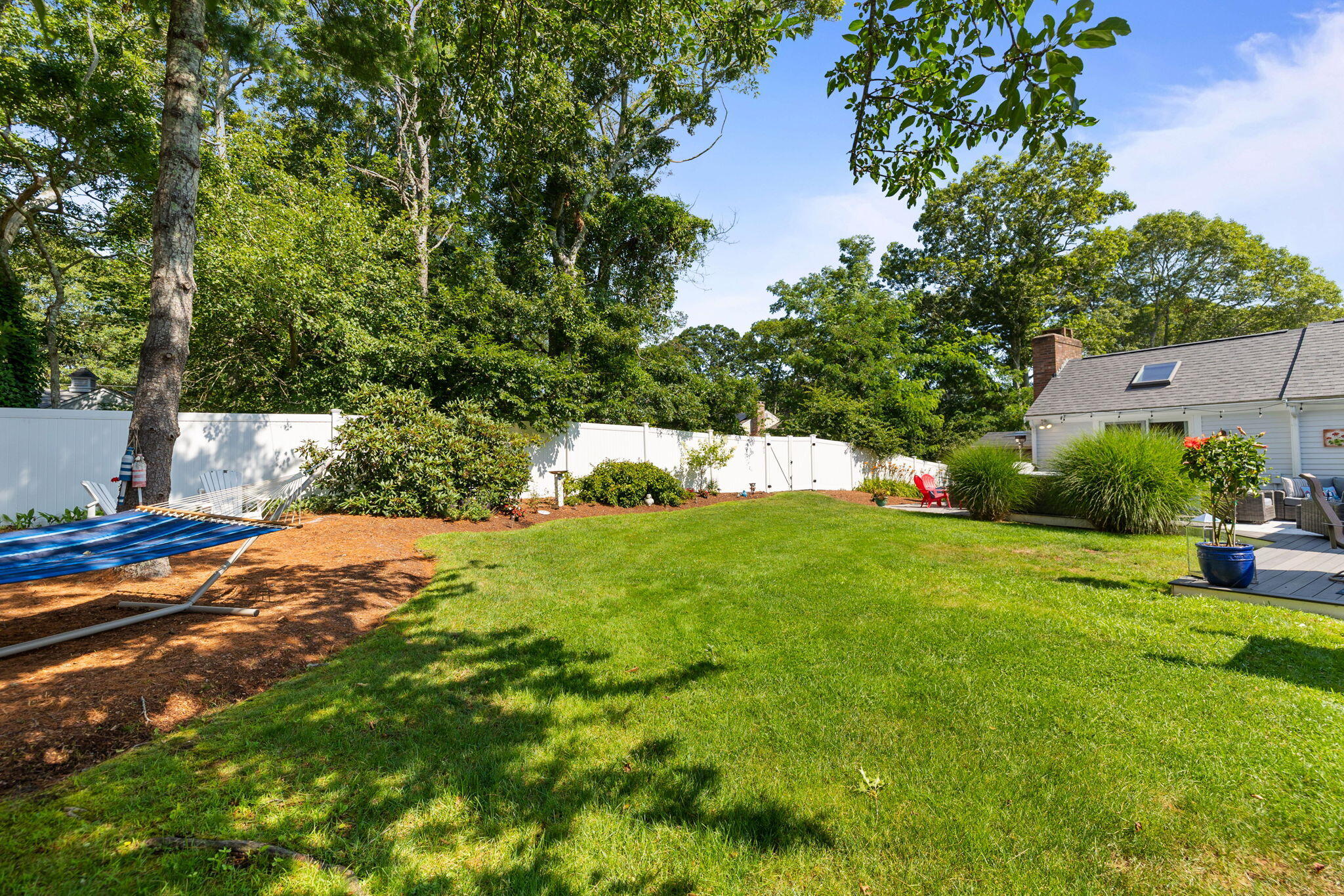 26 Captain Chase Road South Yarmouth, MA 02664 - Photo 36 of 54 a view of a backyard of the house