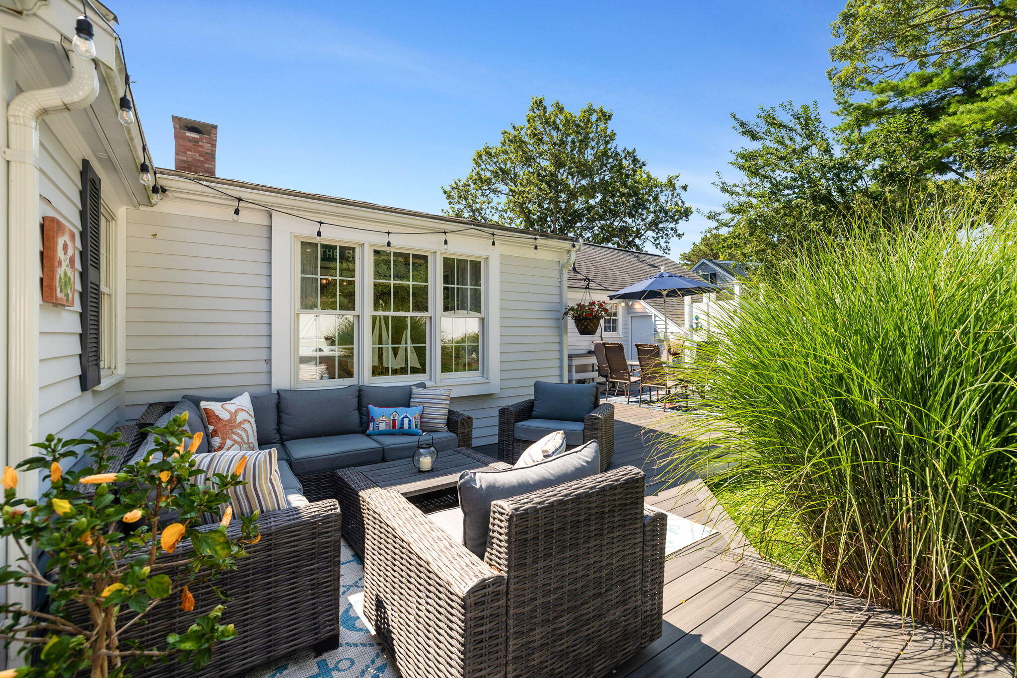 26 Captain Chase Road South Yarmouth, MA 02664 - Photo 42 of 54 a view of a house with a couches in a patio