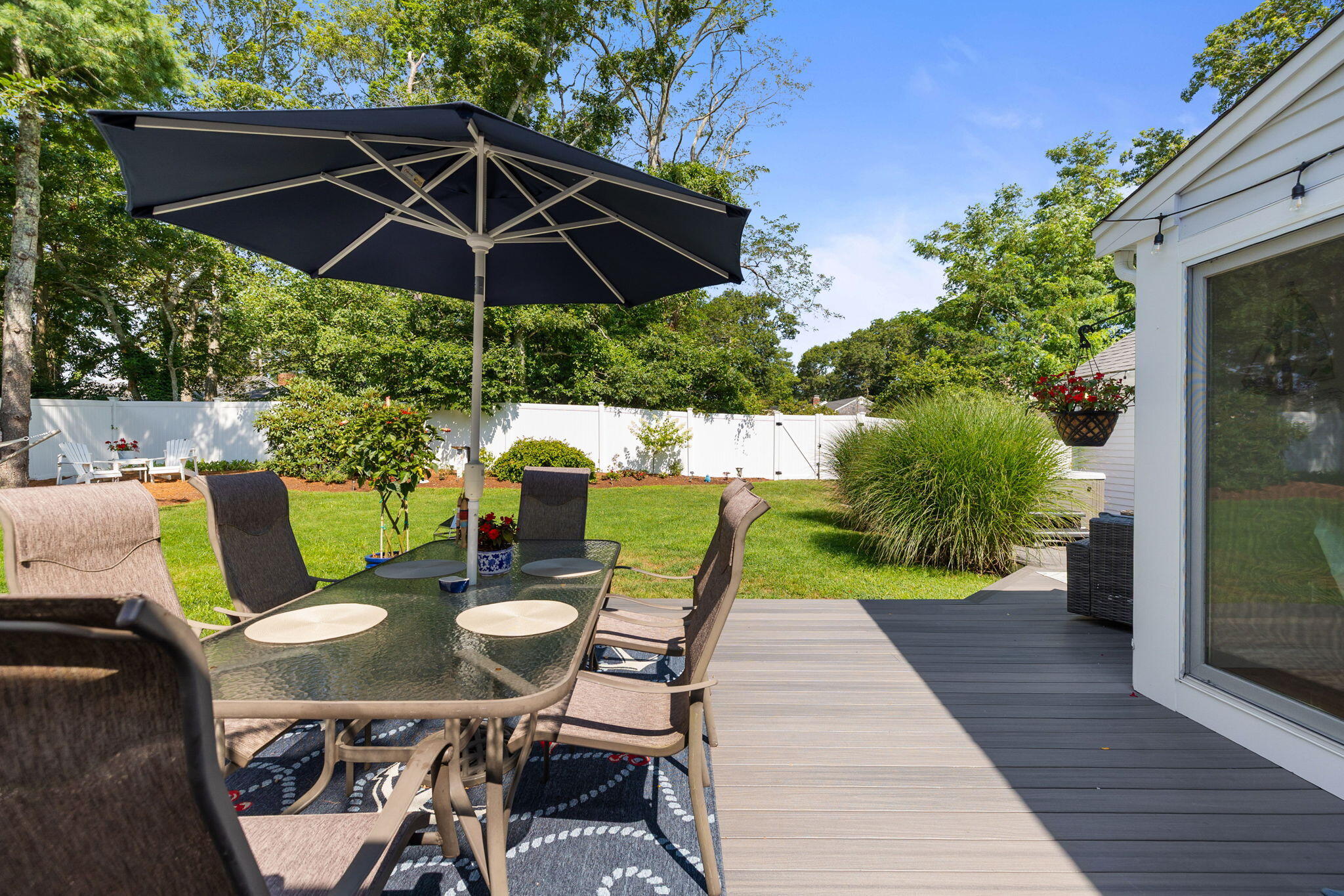 26 Captain Chase Road South Yarmouth, MA 02664 - Photo 45 of 54 a view of an outdoor sitting area with furniture and backyard