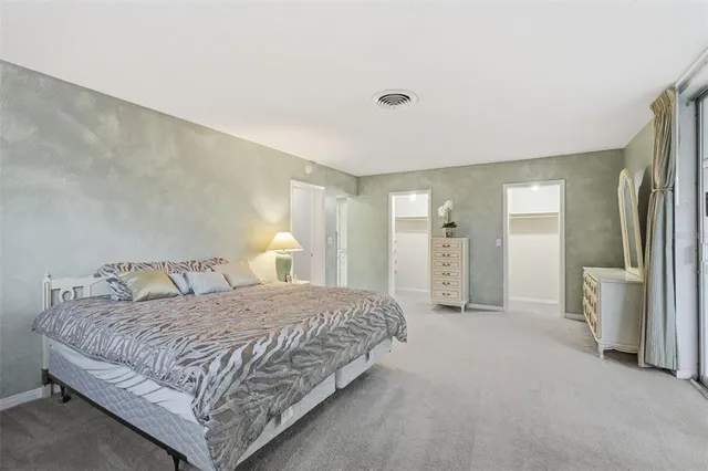 a view of a bathroom from a hallway