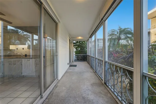 a bathroom with a tub and shower