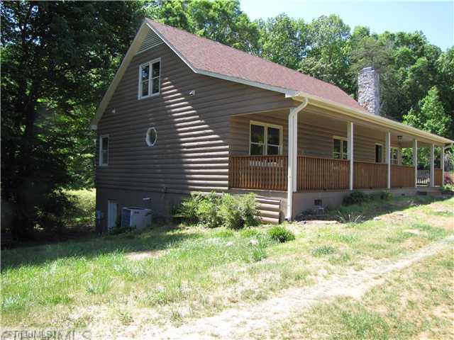 1040 New Moon Road Germanton, NC 27019 - Photo 1 of 16 Exterior Front. Outside of home just painted. Large rocking chair front porch.