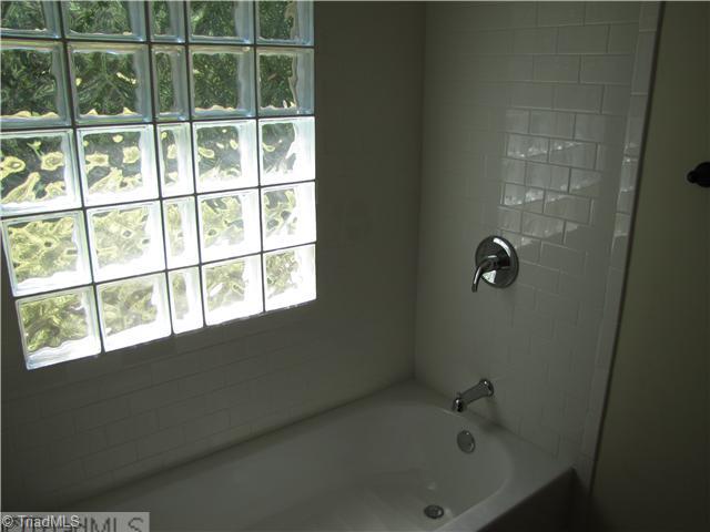 1040 New Moon Road Germanton, NC 27019 - Photo 11 of 16 Master Bath/Spa. New Block window. All new fixtures.