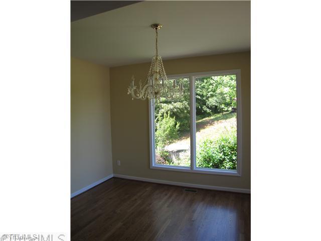 1040 New Moon Road Germanton, NC 27019 - Photo 4 of 16 Dining Room. Hardwood Floors on main level except bedrooms.