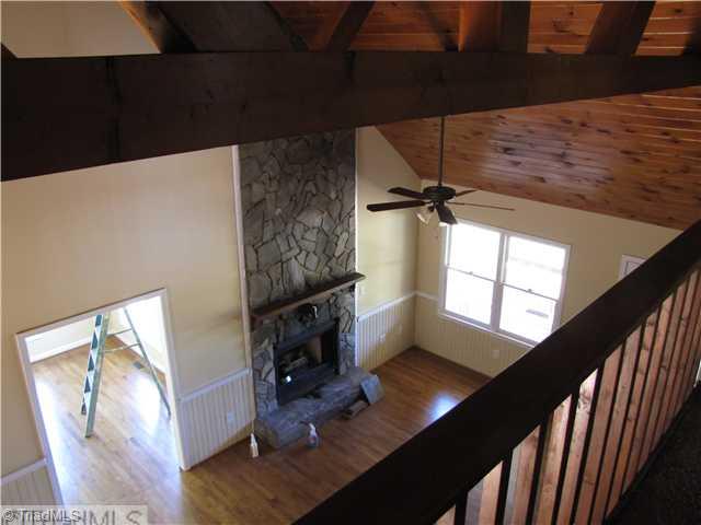 1040 New Moon Road Germanton, NC 27019 - Photo 7 of 16 Living Room. View of Living room from Loft.
