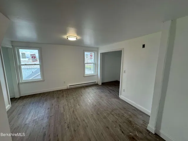 an empty room with window