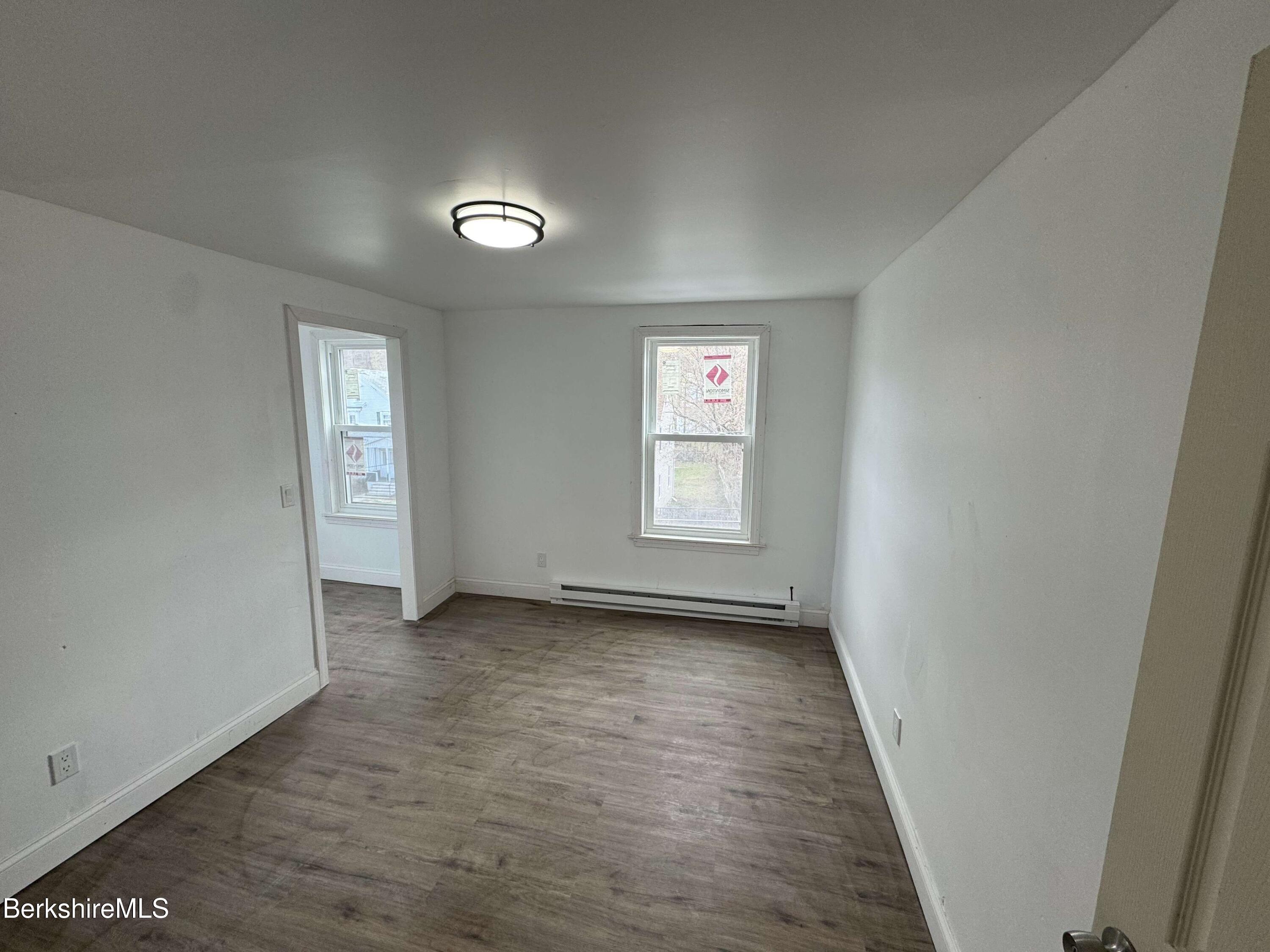 16 North Summer Street, Unit 6 Adams, MA 01220 - Photo 5 of 7 an empty room with window